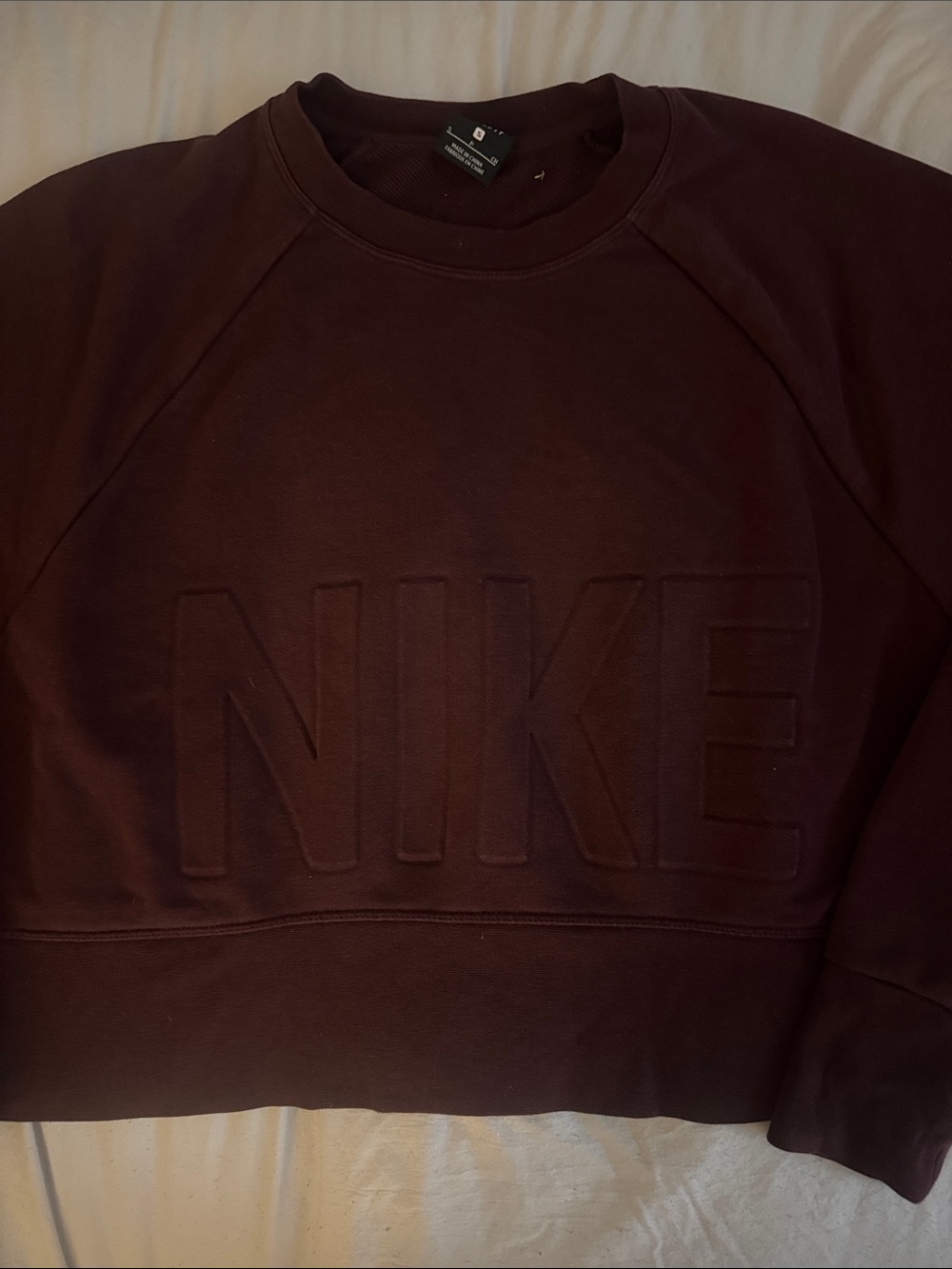 Nike Women’s Crewneck Sweatshirt in Deep Maroon with Embossed Logo